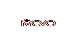 In red and black text the letters "MCVO" are present in a white box. The M has a black circle with red headphones.