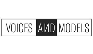 Voices and Models Logo Black rectangle with three sections, one that is white on the left and one that is white on the right, black square in the middle. The first white box says "Voices," the second black box says "and," and the third white box says "Models."